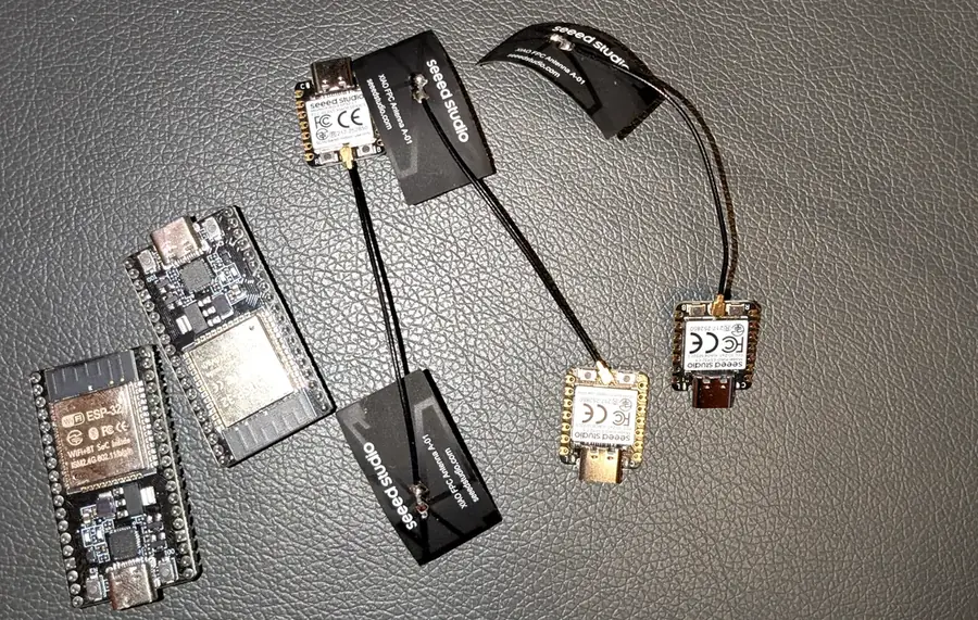 My boards: two ESP32 DevKits and three Seeed XIAO ESP32 with external antennas